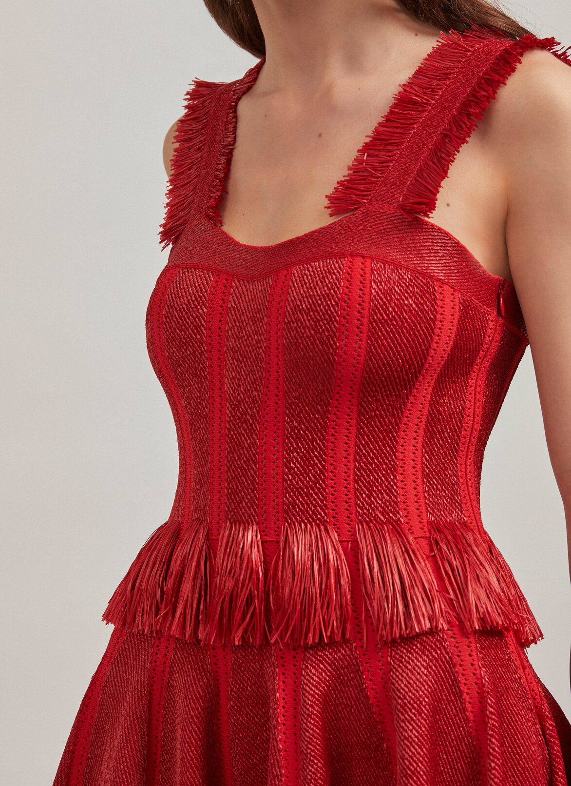 Knit and raffia bustier dress ALAÏA SCARLET KNIT AND RAFFIA BUSTIER DRESS